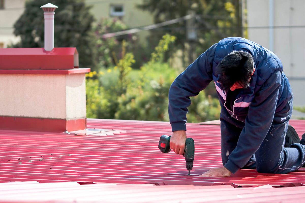 flat red metal roofing panels