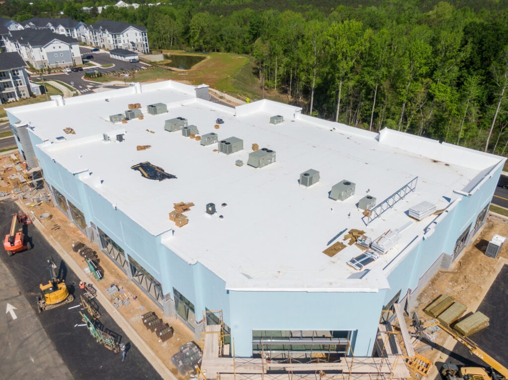 Drone Images of TPO Flat Commercial Roof With Metal Panels